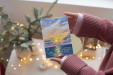 Закатное фиолетовое небо с отражением солнца в море